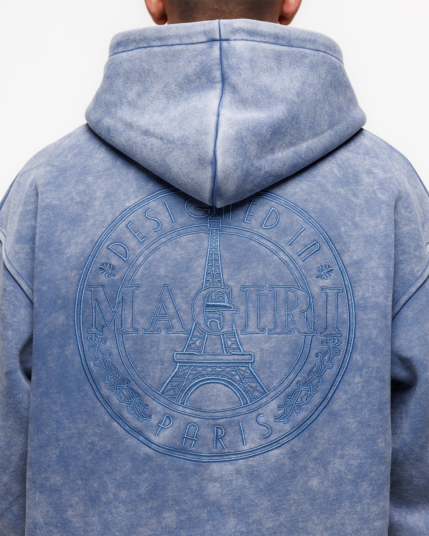 Magiri Embroidered Acid Wash Hoodie in Washed Blue